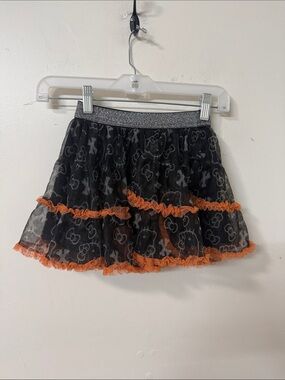 Hello Kitty Black Skirt with Orange Ruffle Trim dated 2016